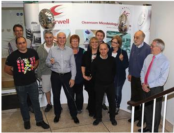 Andy and Lawrence Whittard celebrating 45 year anniversary with some of the Cherwell team