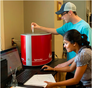 Dr Irosha Nawarathne discusses results from the Magritek Spinsolve with one of her students in the Chemistry Department at Lyon College, AR