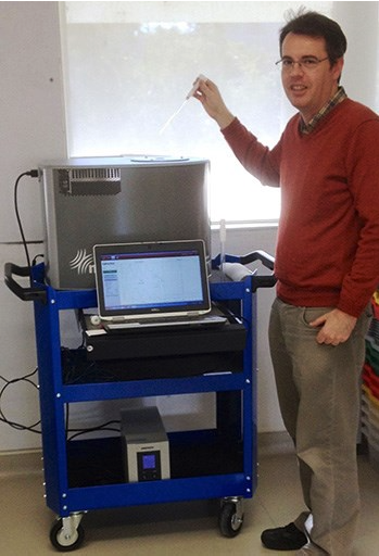 Dr Philip Sharpe with his Spinsolve NMR spectrometer 