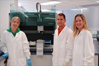 Forensic scientists Jennifer Jarrett Robert Binz and Heather Pevney with one of the DNA Sections Freedom EVO workstations