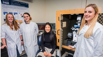 Professor Huabing Yin and her students with their JPK NanoWizard AFM with the CellHesion module at the University of Glasgow
