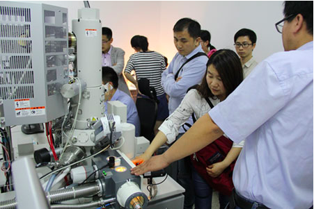 Visitors to Professor He's laboratory at Nanjing Agricultural University look at the Quorum PP3010T Cryo-SEM sample preparation system